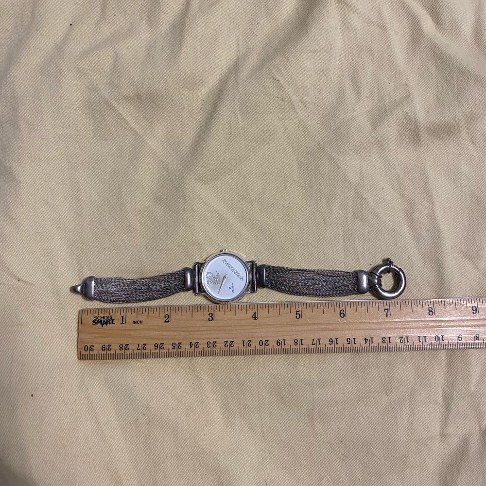 More uncle’s stuff vintage sterling silver watch. Watch not working missing back